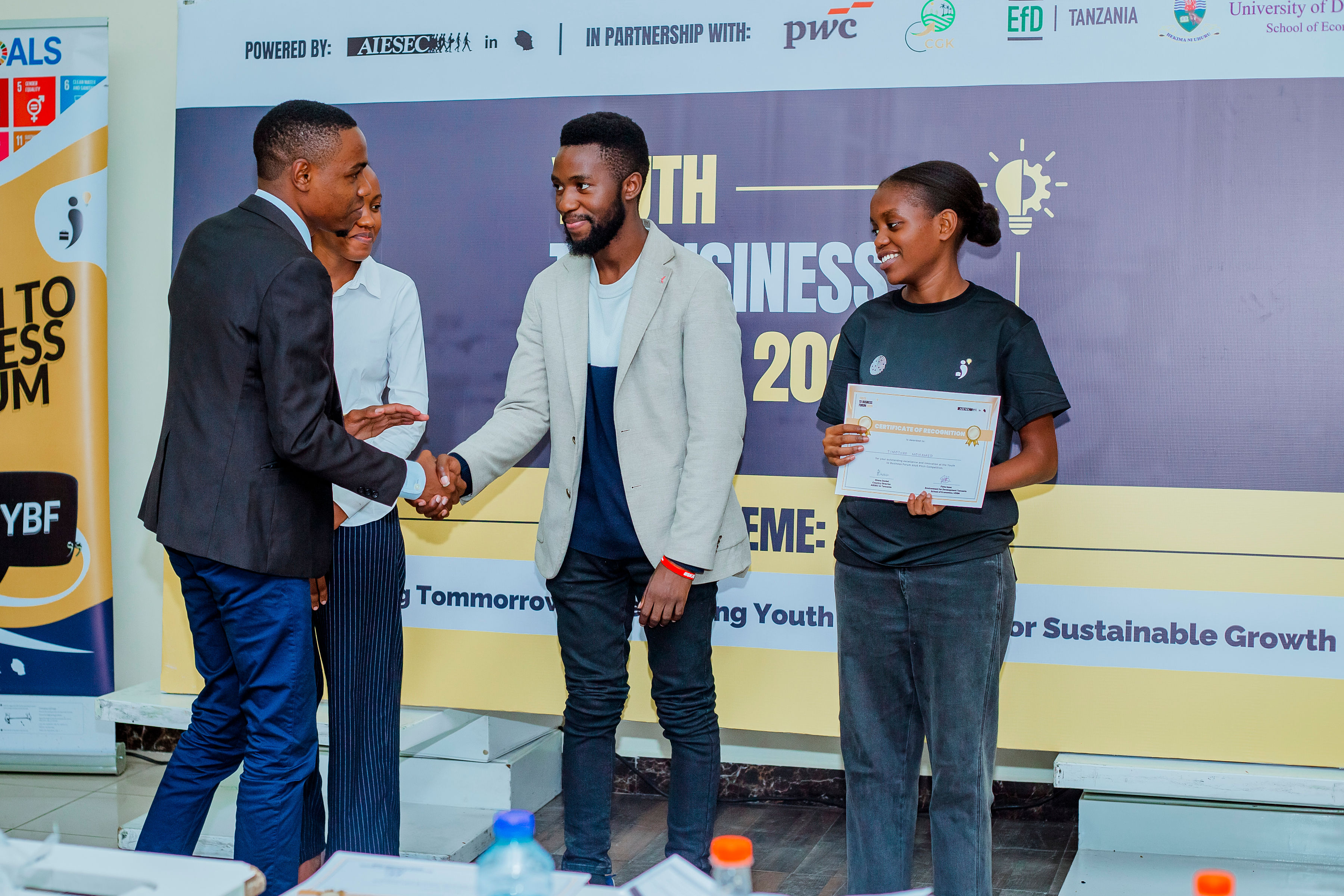 Timotheo Ramadhani Mohamed receiving AIESEC recognition