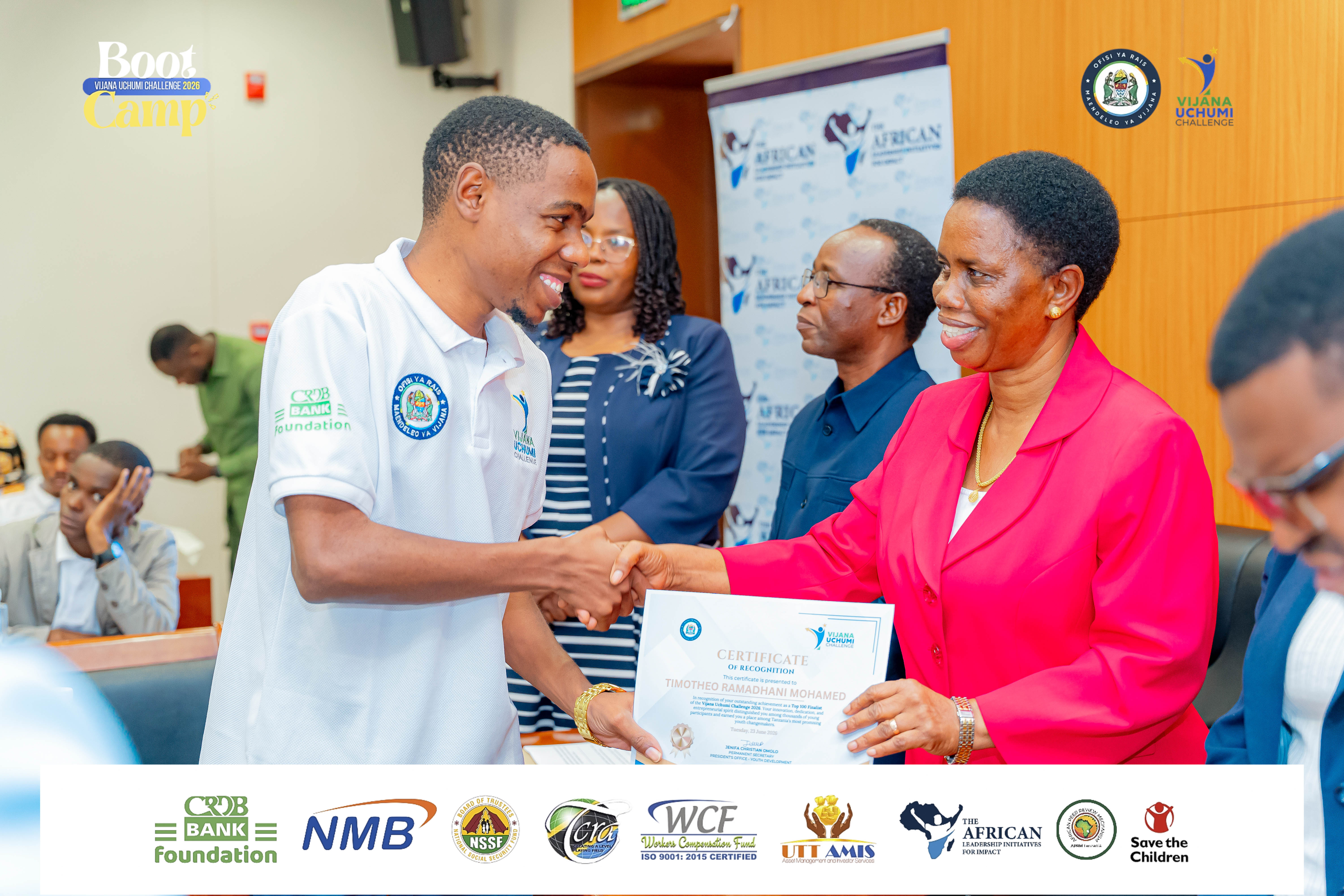 Timotheo Ramadhani Mohamed receiving recognition at Vijana Uchumi Challenge 2026